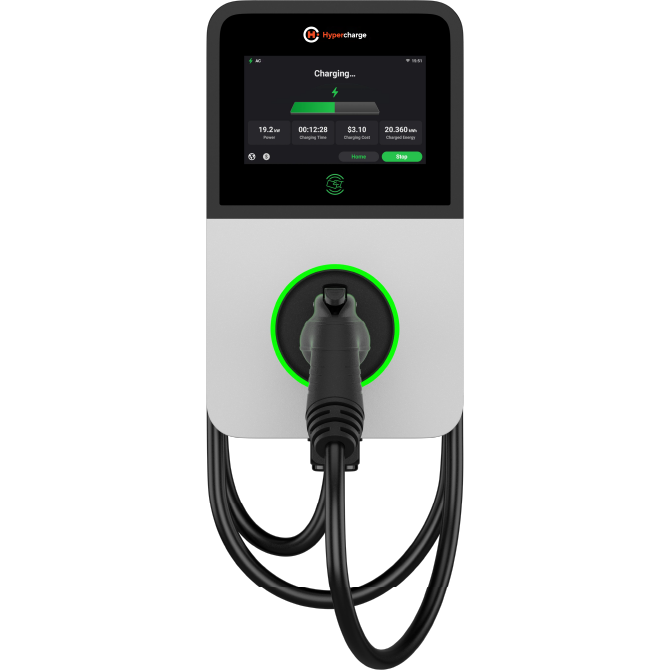 Autel MaxiCharger AC Pro electric vehicle charging station with a digital display screen showing charging status and a plug connected to the unit. The charger is black and white with a glowing green light around the socket.